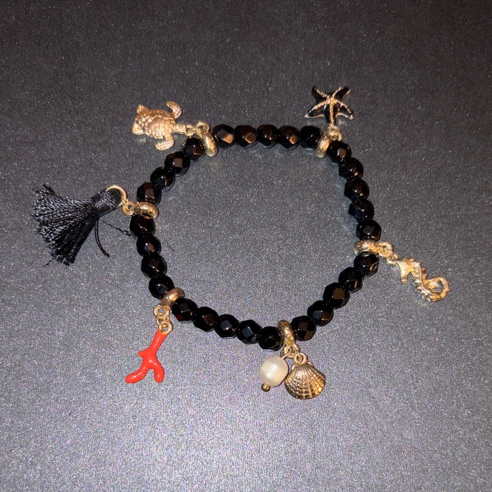 Gold and Black Sea Life Charm Bracelet